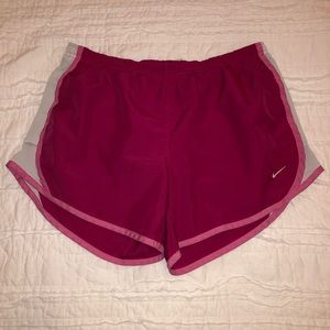 Pink and white Nike shorts
